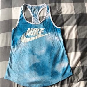 Blue tie dye Nike shirt.